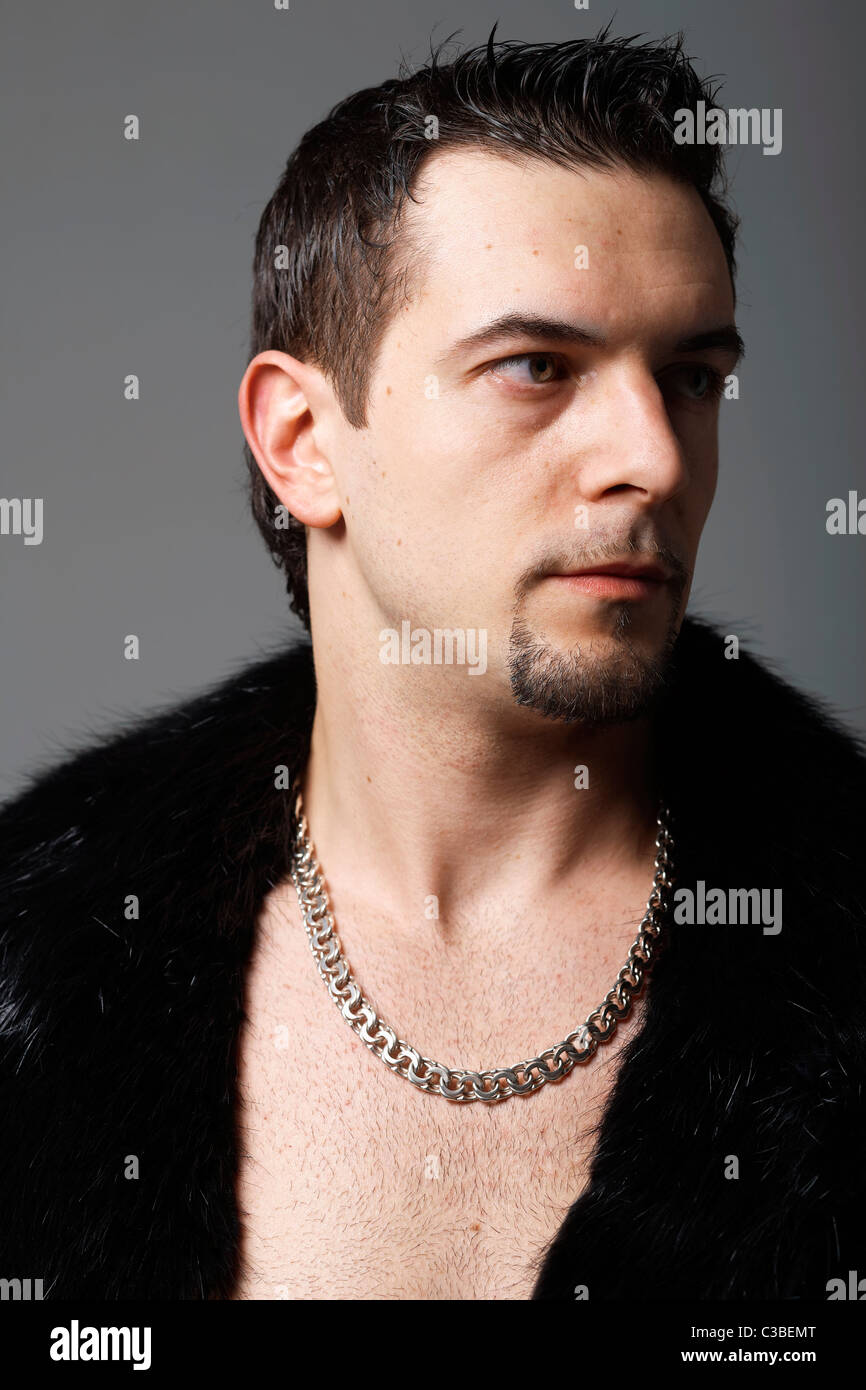 Muscular man in leather jacket hi-res stock photography and images - Alamy