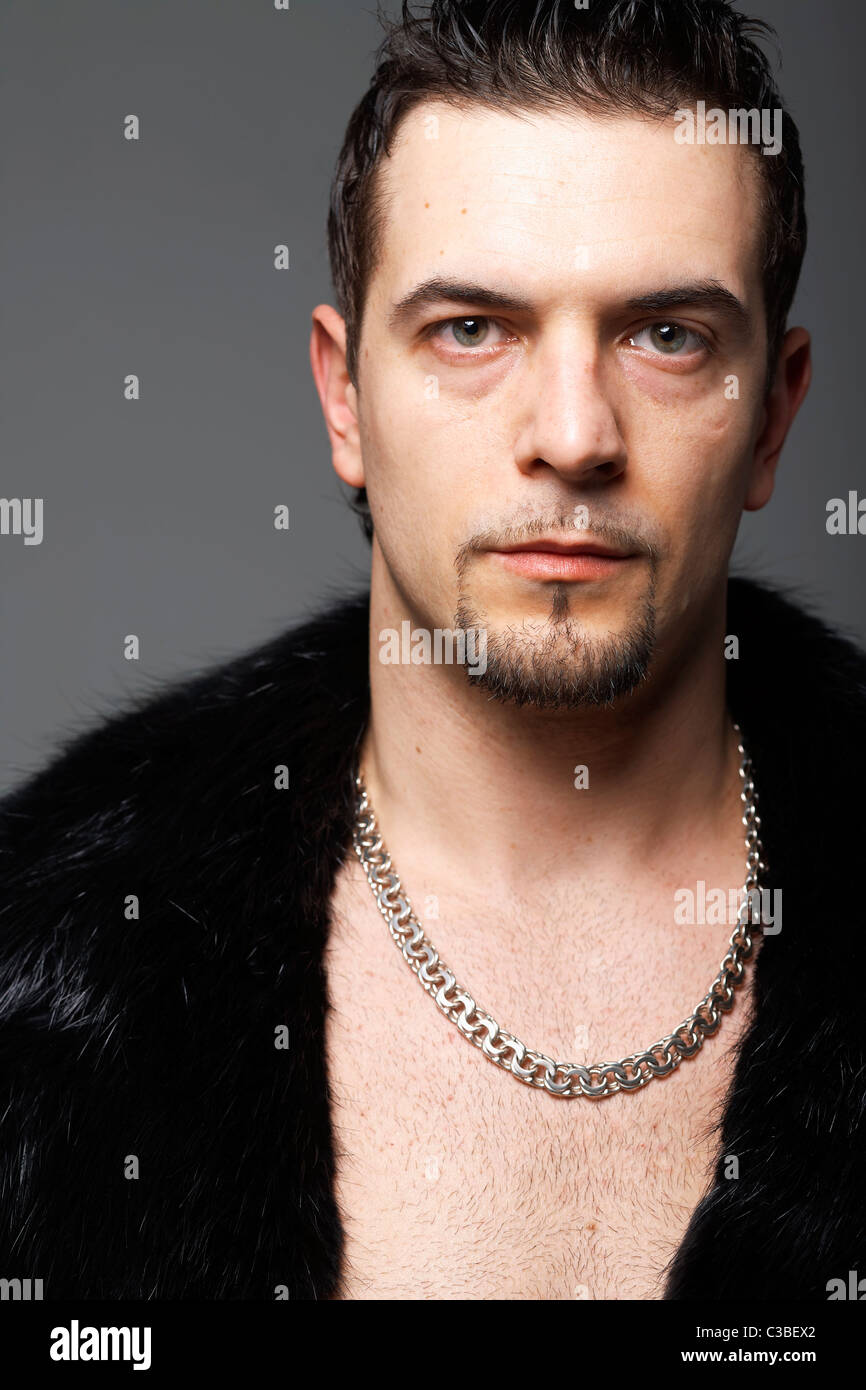Muscular man in leather jacket hi-res stock photography and images - Alamy