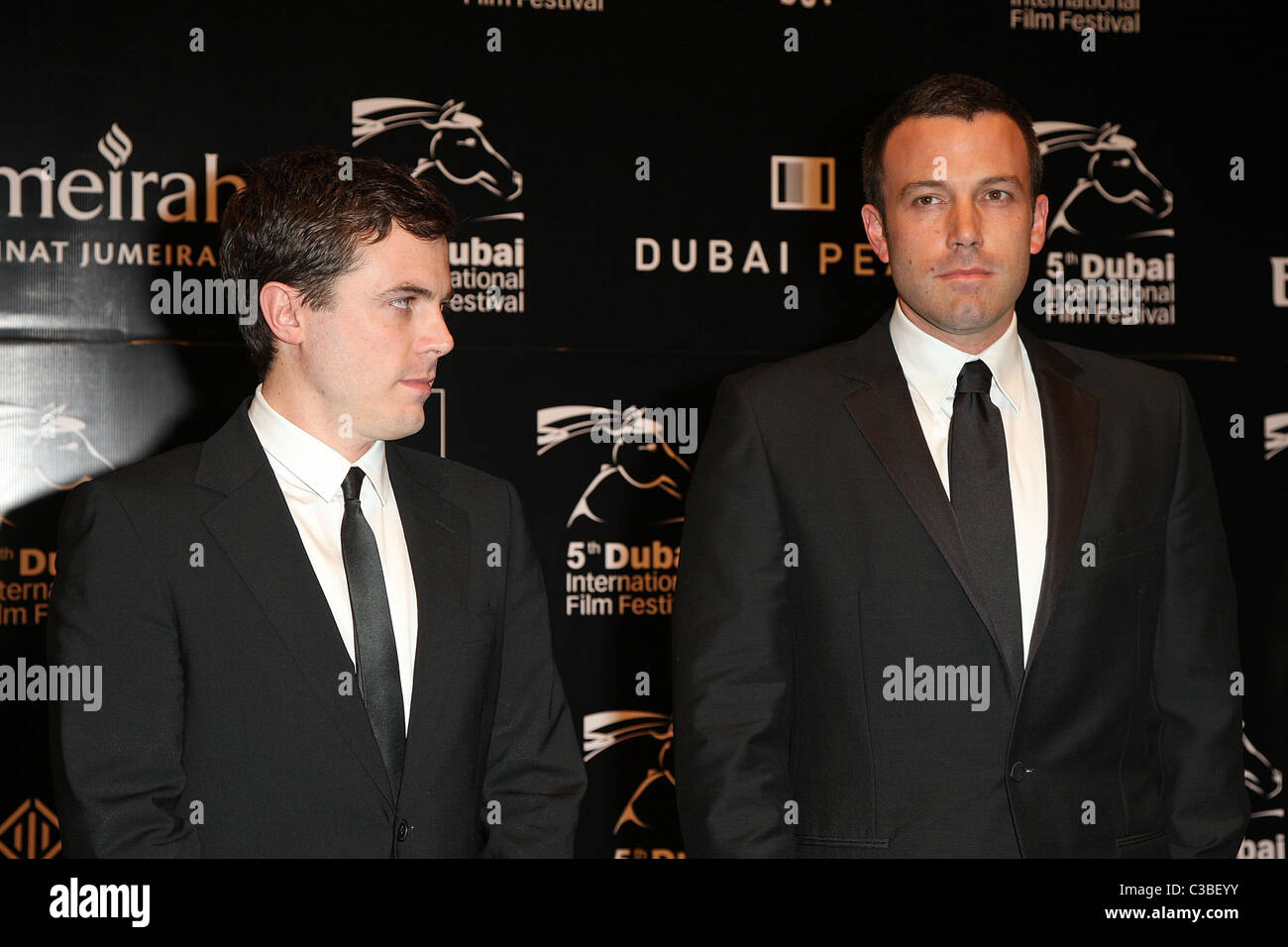Casey Affleck and Ben Affleck Opening Night Gala of The 5th Annual Dubai International Film Festival held at the Madinat Stock Photo