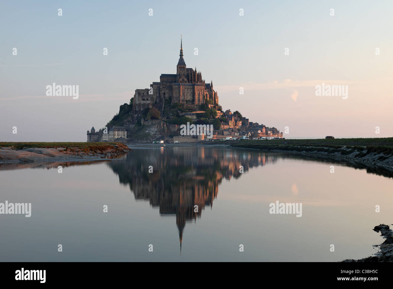 Le Mont St Michel Bathed in Soft Early Morning Dawn Light Normandy France Stock Photo