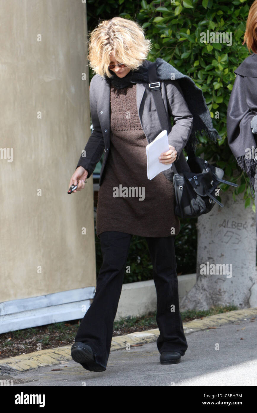 Meg Ryan seen walking back to her car with her head down from the