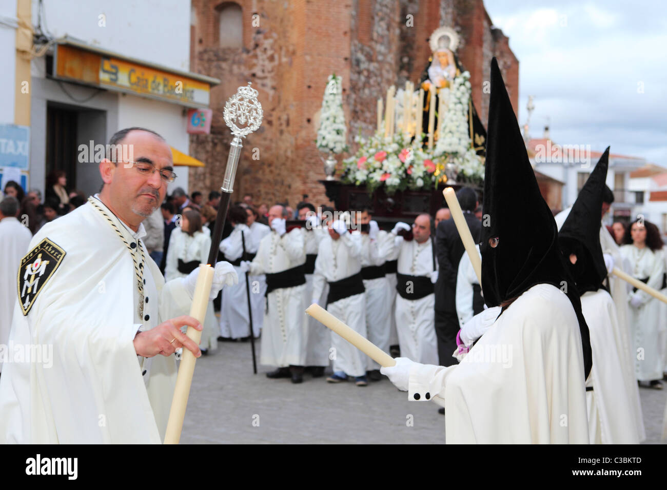 Candles are lit for an Easter Week (Semana Santa) procession in the