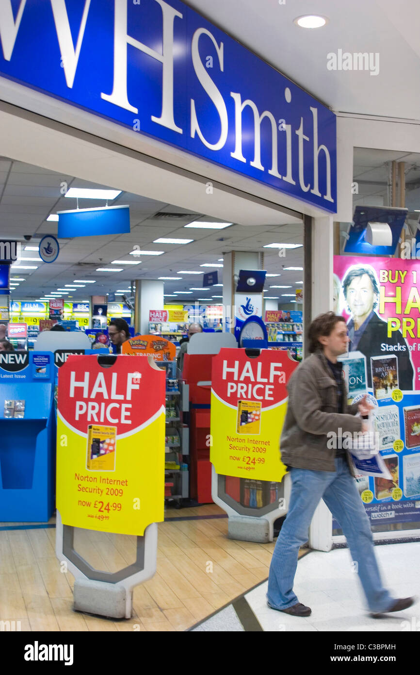 A customer leaving a WH Smith store in Central London. Stock Photo