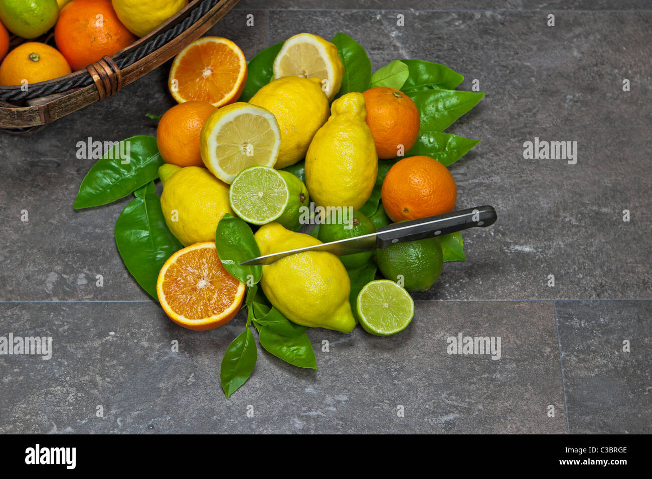 assortment with citrus fruits in a basket Stock Photo