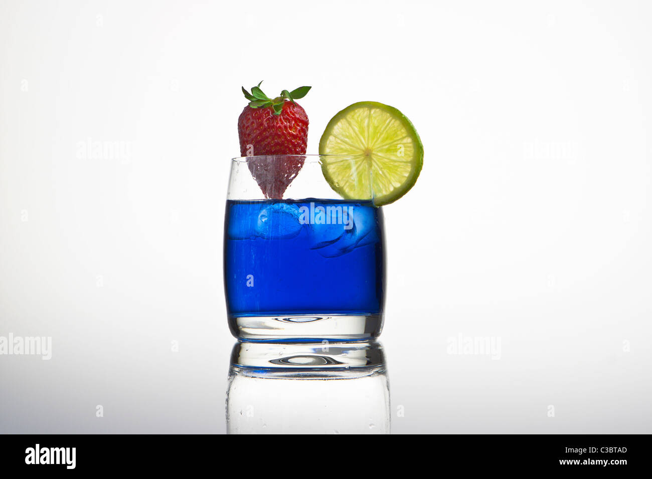 blue cocktail with lemon Stock Photo - Alamy