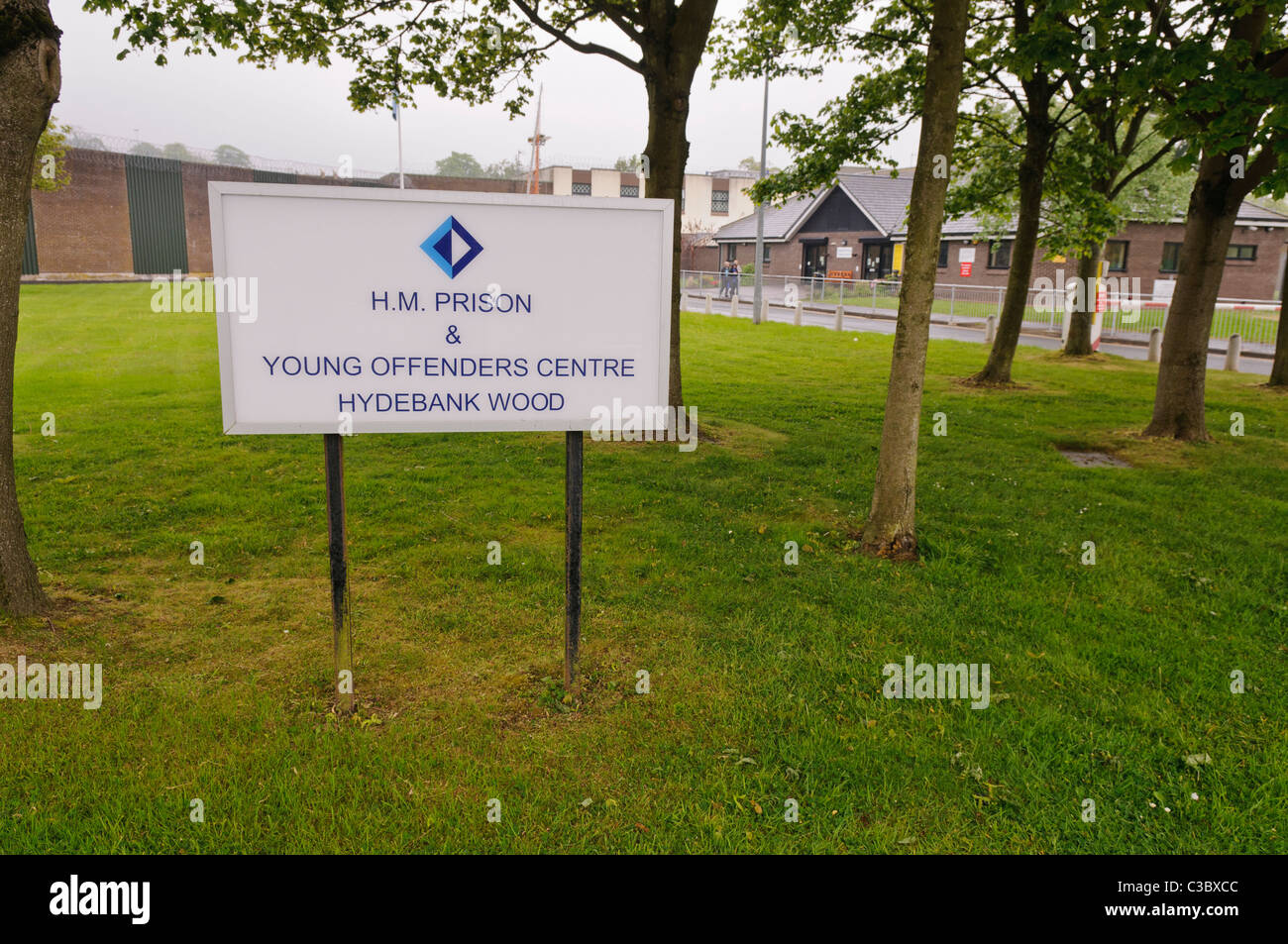 Sign outside entrance to Hydebank Wood Young Offender's Centre, Belfast Stock Photo
