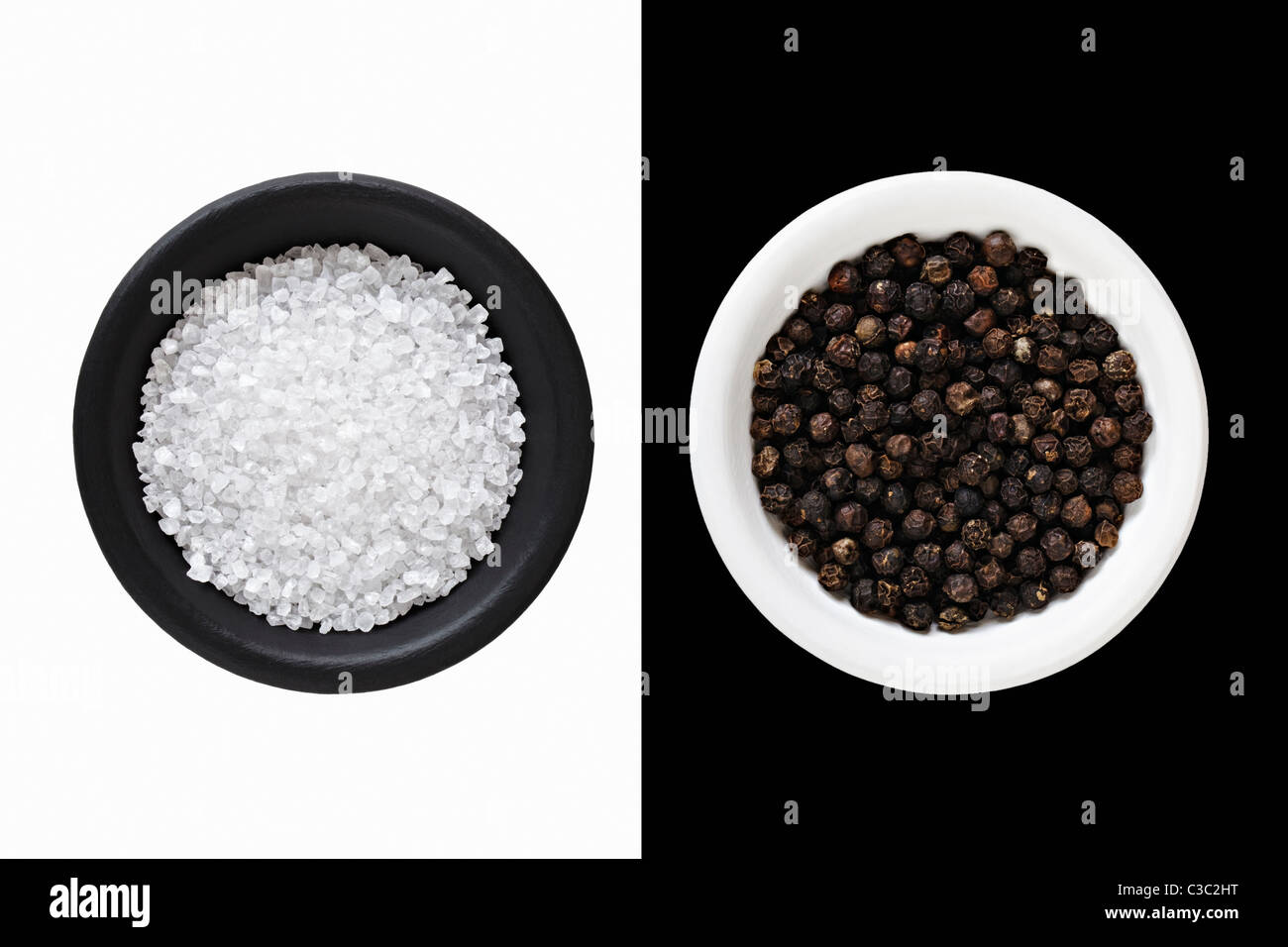 Rock Salt and black Peppercorns Stock Photo