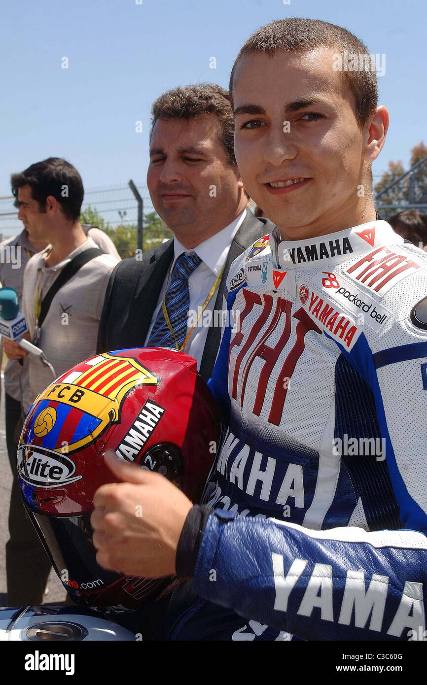 Yamaha MotoGP pilot Jorge Lorenzo of Spain poses with his new helmet  decorated with the seal of Football Club Barcelona ahead Stock Photo - Alamy