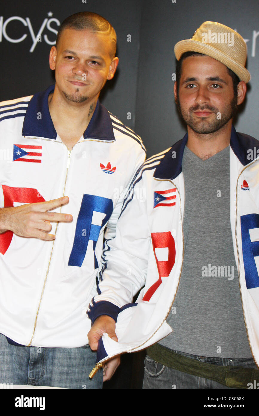 Hip Hop duo Calle 13 members René Pérez, a.k.a. Residente and Eduardo  Cabra, a.k.a. Visitante visit Macy's Herald Square New Stock Photo - Alamy