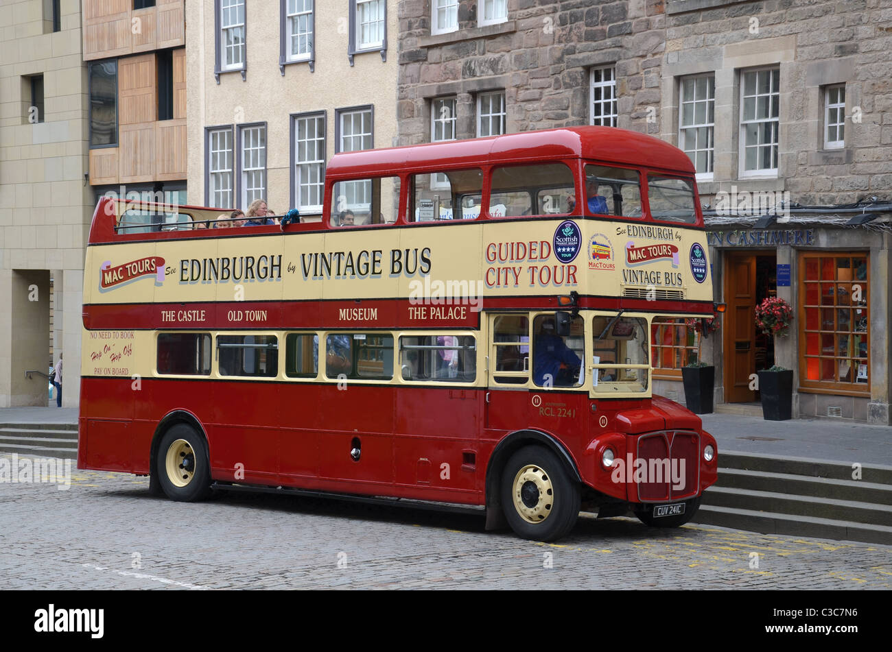 Open-topped vintage tour bus in the Lawnmarket in Edinburgh, Scotland, UK. Stock Photo