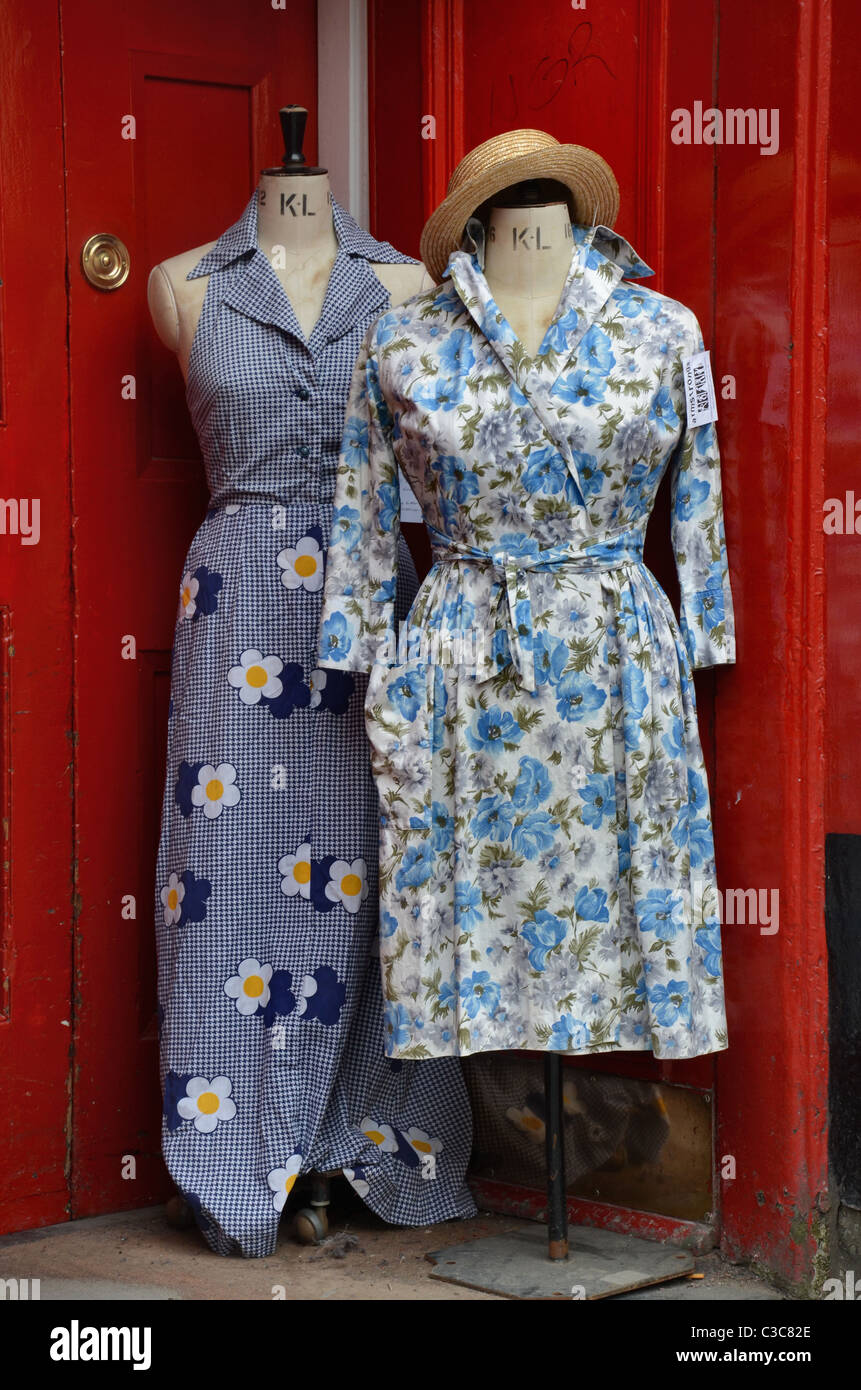Vintage dresses in  the doorway of a branch of Armstrong's vintage clothing store in Edinburgh, Scotland, UK. Stock Photo