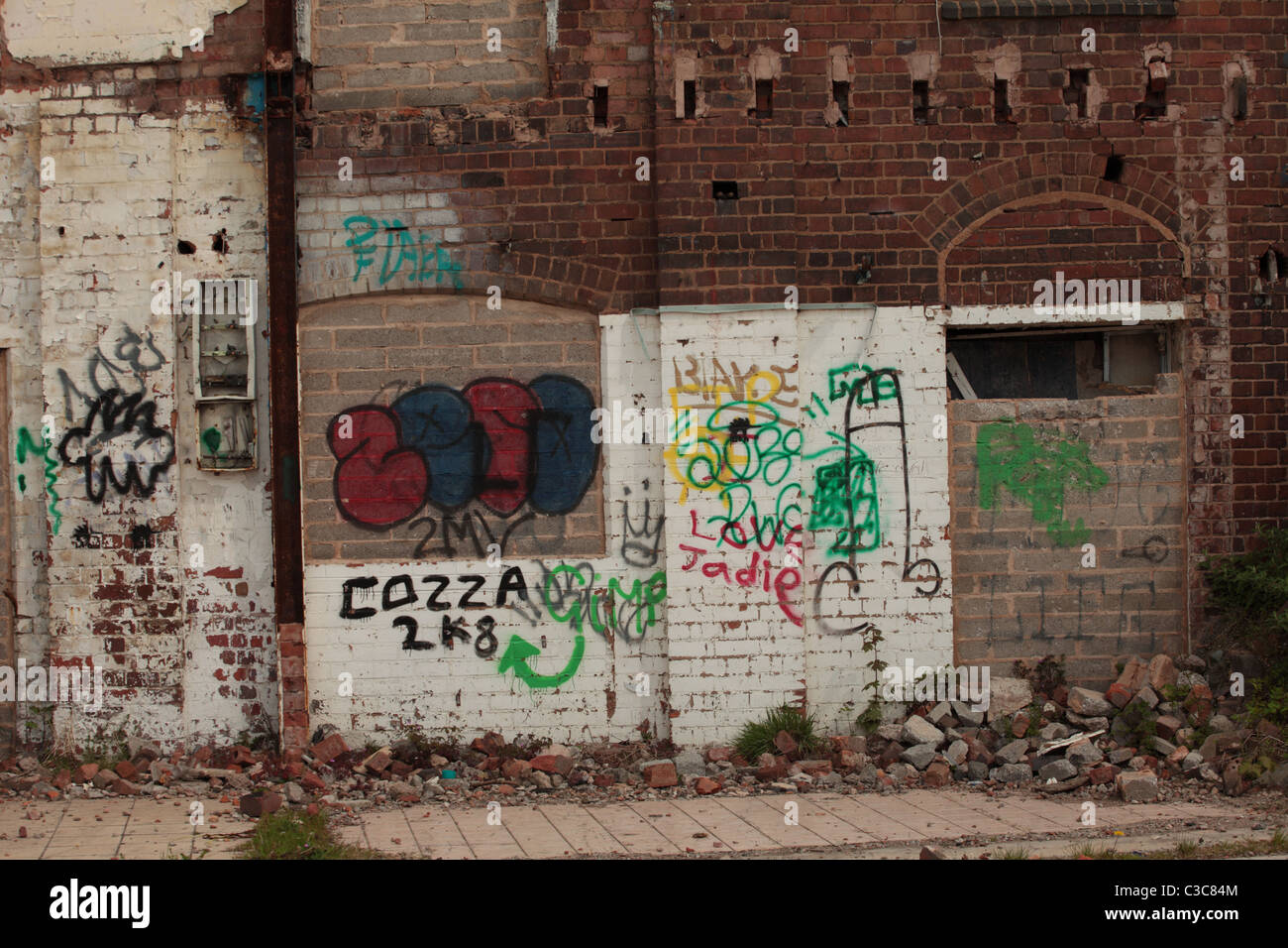 Graffiti-covered wall, disused factory, West Midlands, UK Stock Photo ...