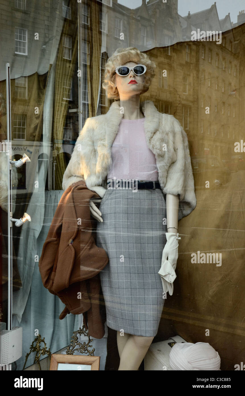 A mannequin in the window of Armstrong's vintage and retro clothing store in the Grassmarket, Edinburgh, Scotland, UK. Stock Photo