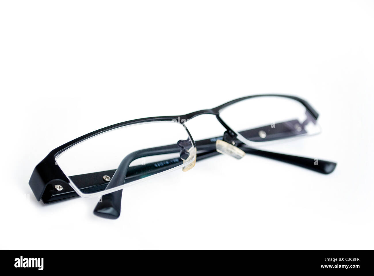 black reading glasses isolated on white Stock Photo