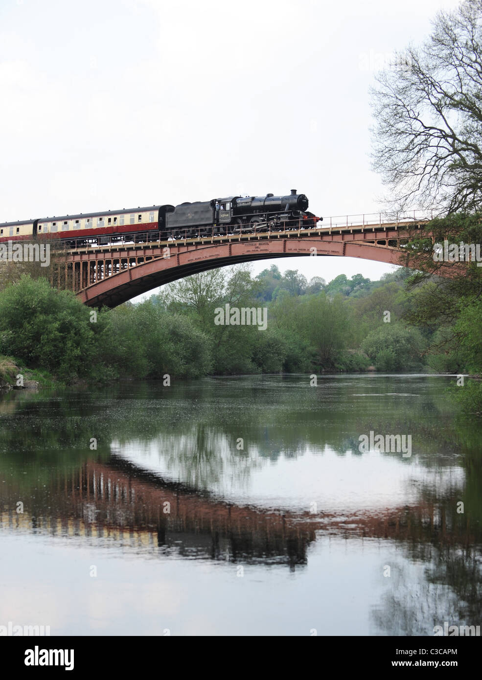 Steam Locomotive crossing Severn Valley Railway Victoria Bridge Arley in Worcestershire England Uk Stock Photo