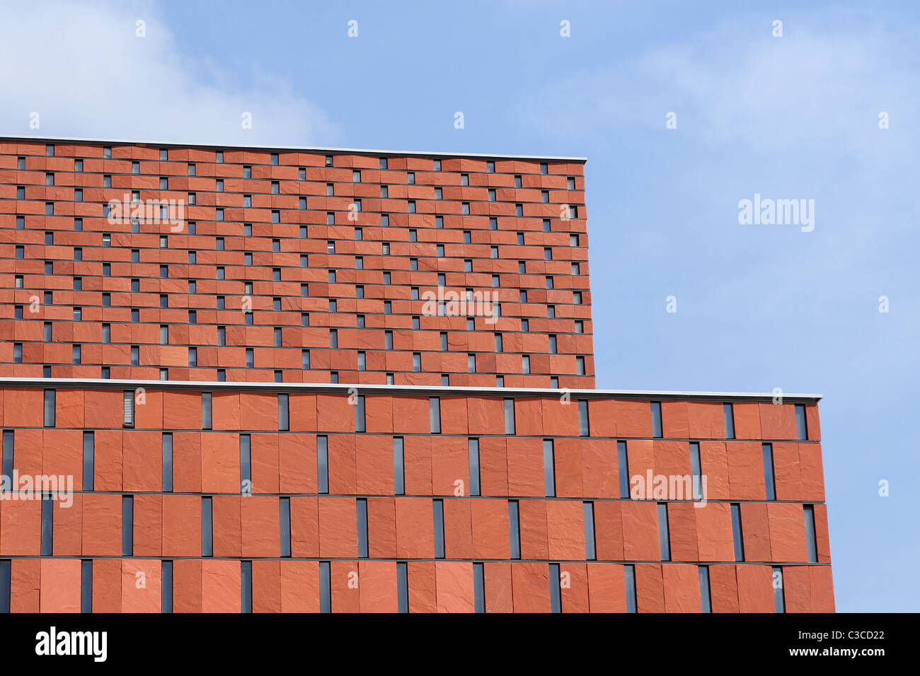 The Scientific Information Centre and Academic Library in Katowice. Details of red sandstone facade. Stock Photo