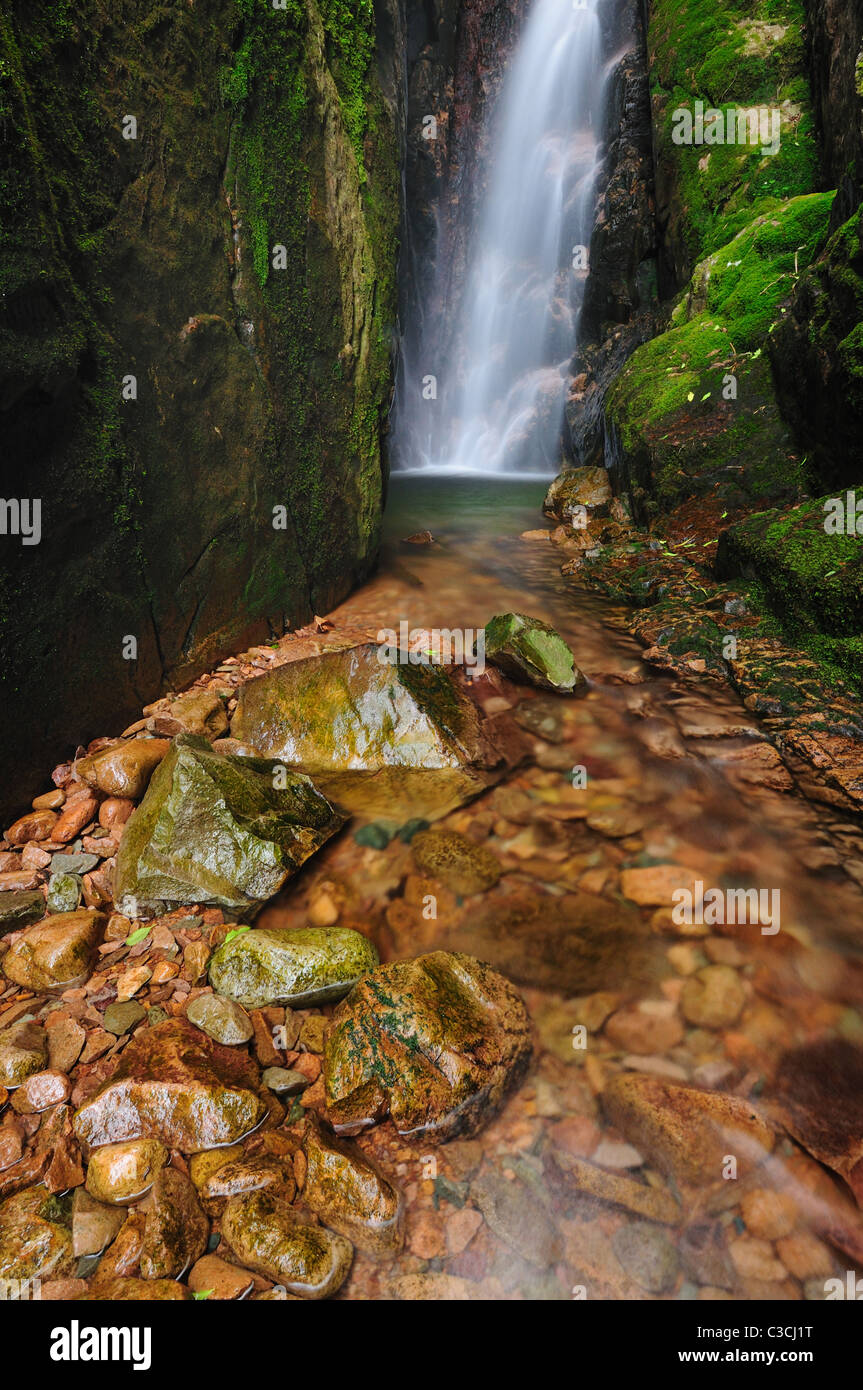 Narrow ravine of Scale Force waterfall between Buttermere and Crummock