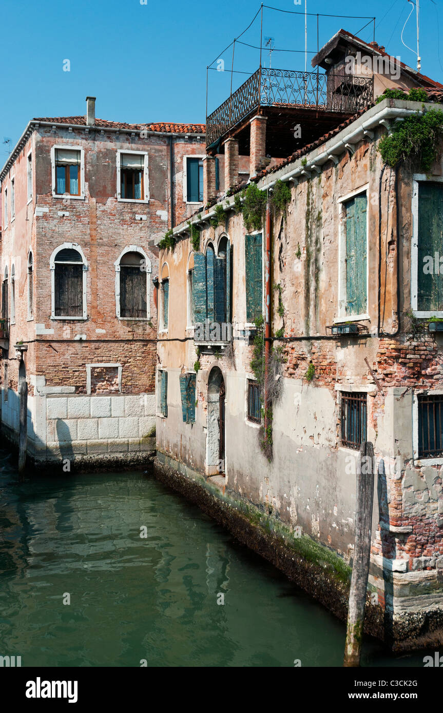 Old buildings on water canal in Venice, Italy Stock Photo - Alamy