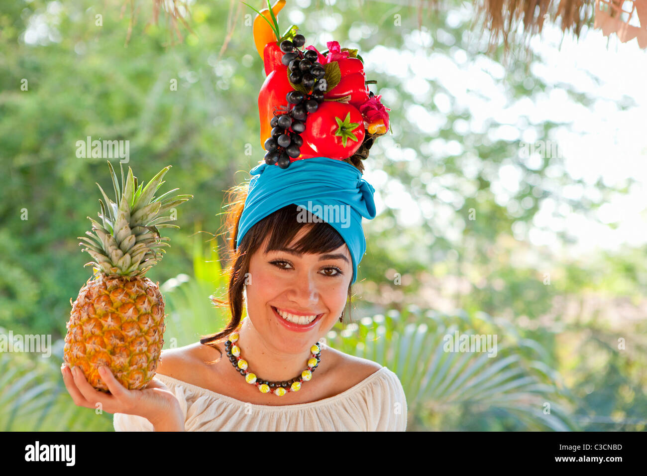 Woman tropical fruits camera view hires stock photography and images Alamy