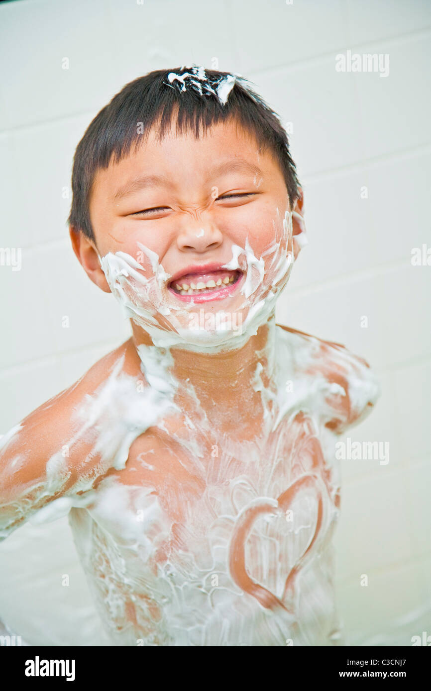 boy covered in shaving cream Stock Photo Alamy