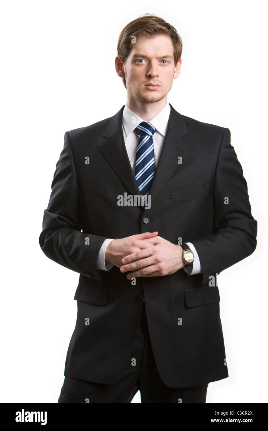 Portrait of young handsome businessman looking at camera on white ...