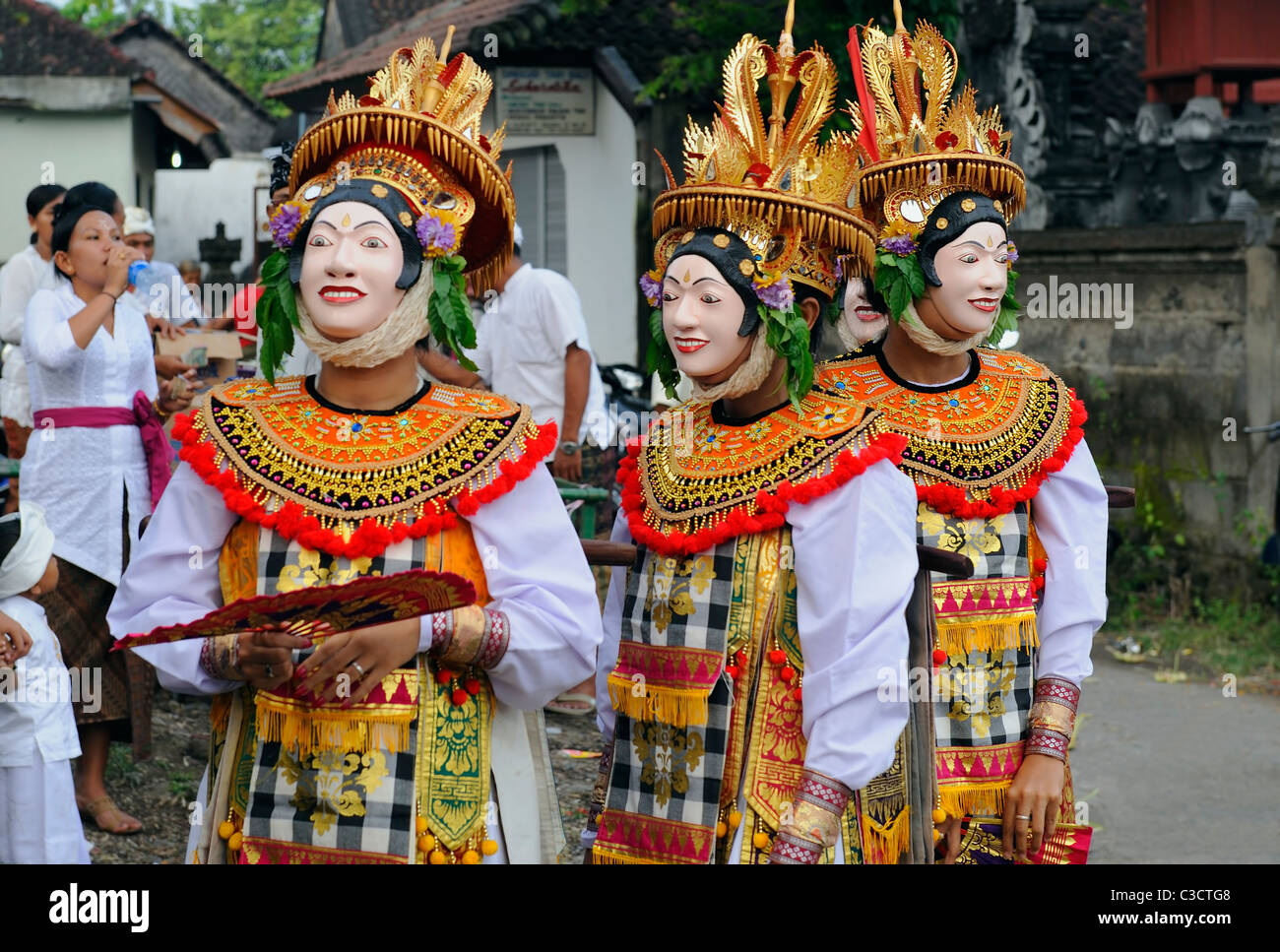 balinese dancers in colorful masks and costumes, indonesia Stock Photo