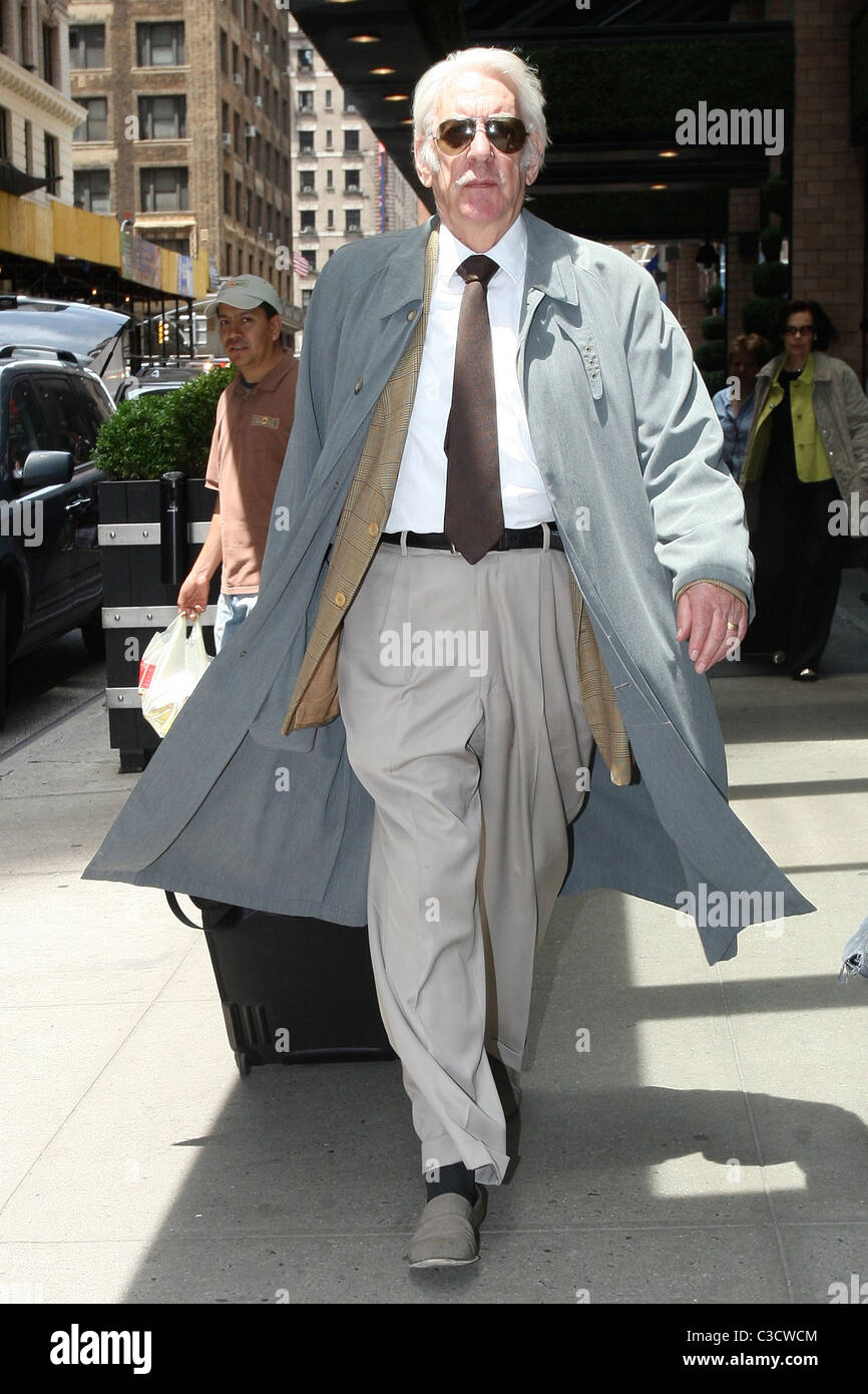 Donald Sutherland out and about in Manhattan while wearing a trench
