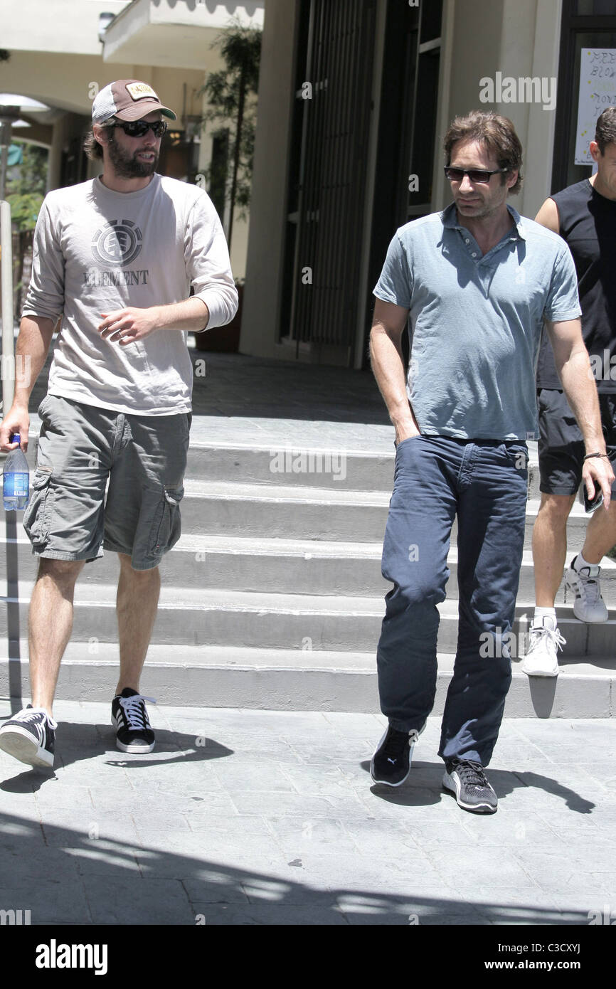 David Duchovny has blood rolling down his neck as he leaves Brentwood  Country Mart with a friend Los Angeles, California Stock Photo
