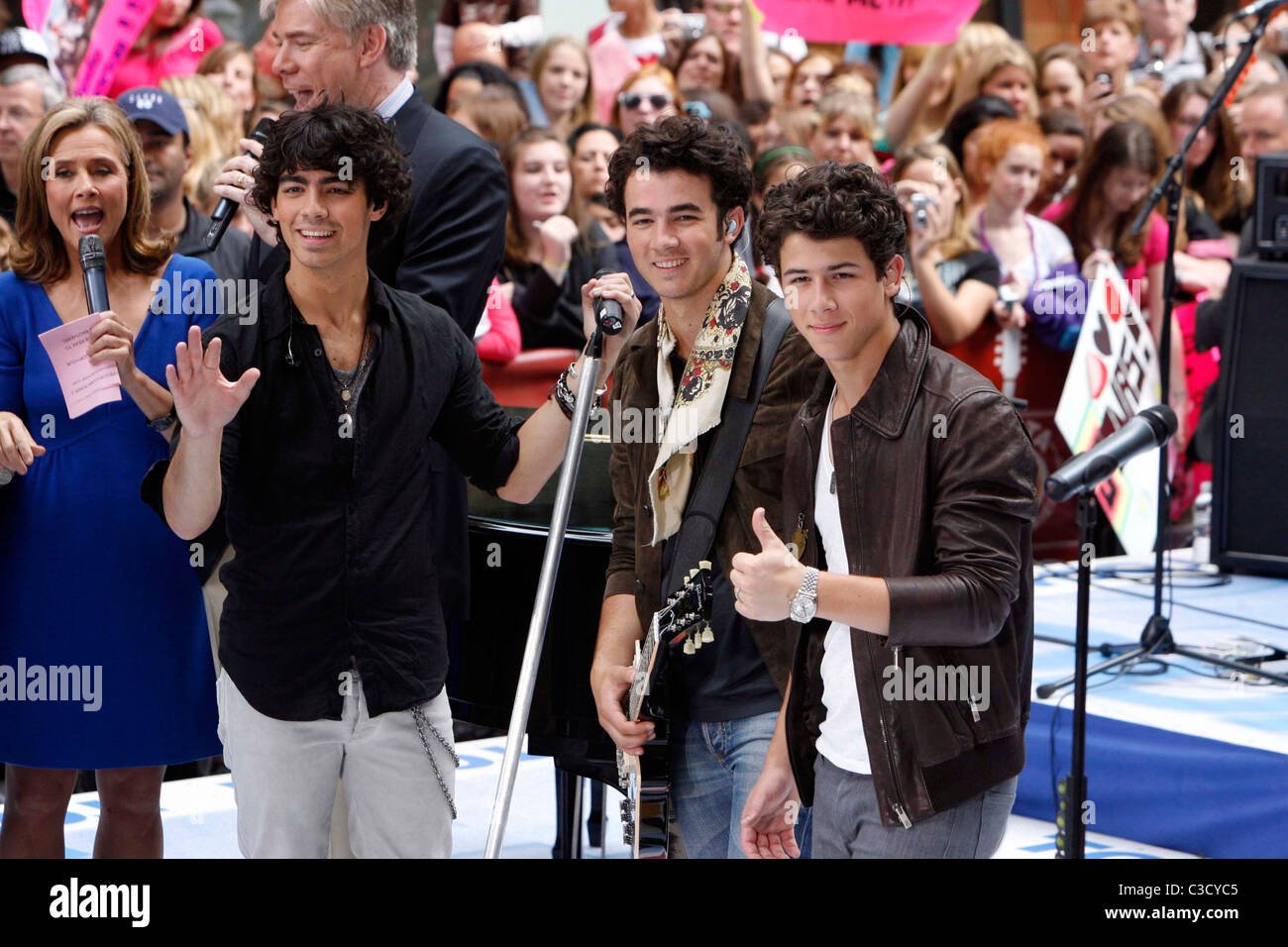 Joe, Kevin and Nick Jonas of The Jonas Brothers perform live at NBC's