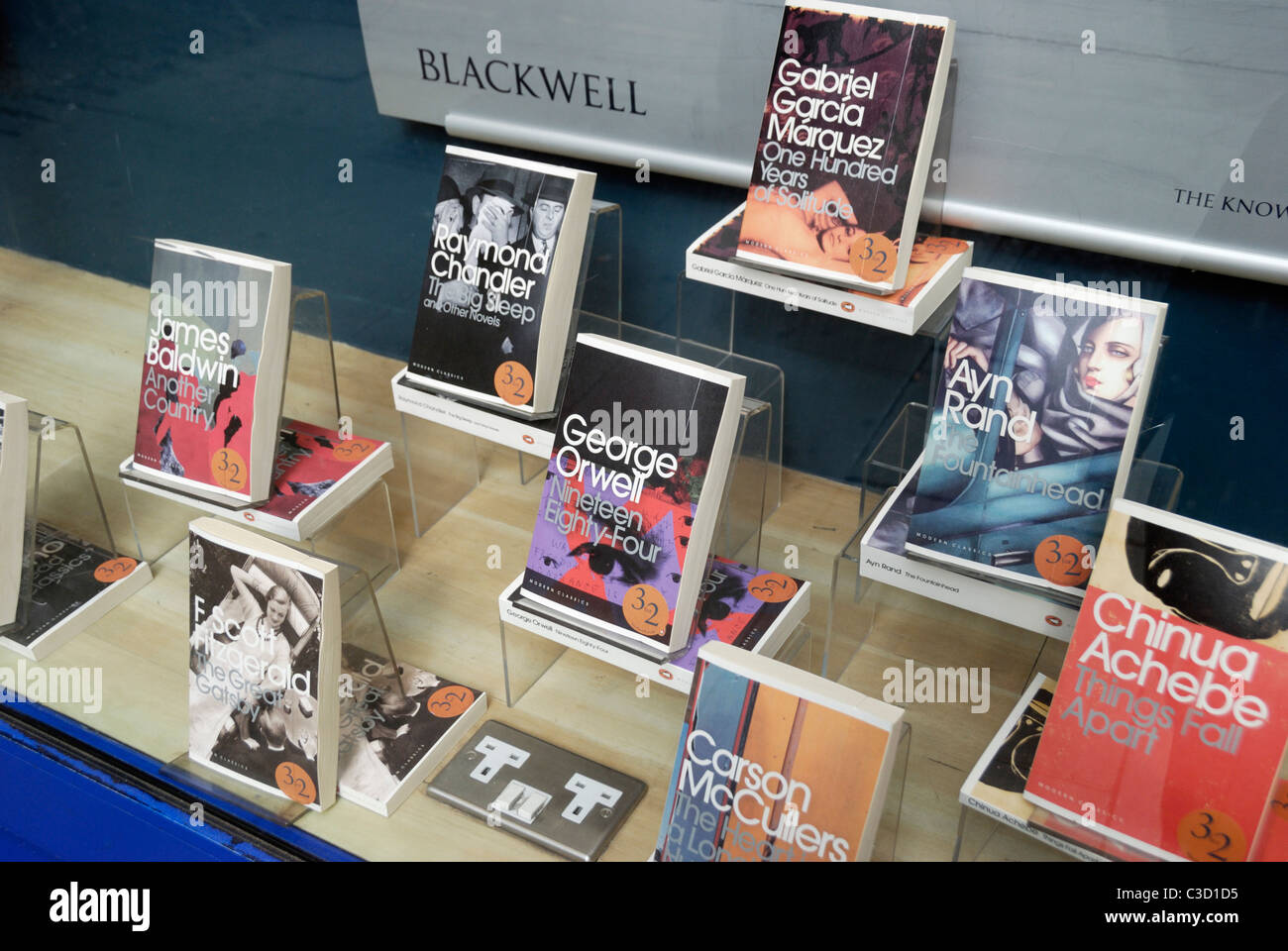 Modern classic fiction books in a shop window Stock Photo