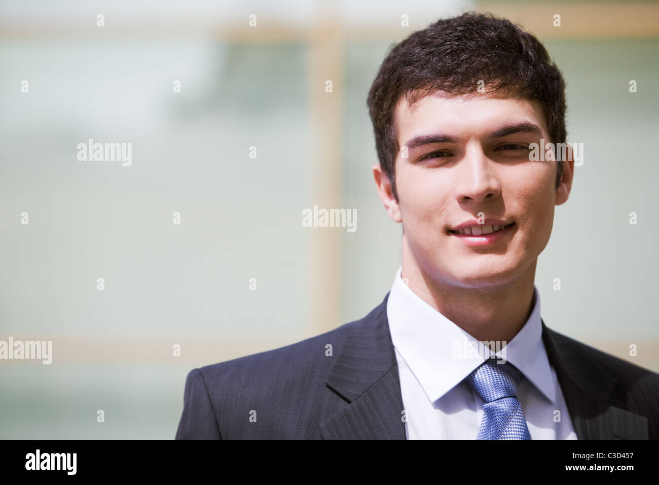 Face of modern businessman looking at camera Stock Photo - Alamy