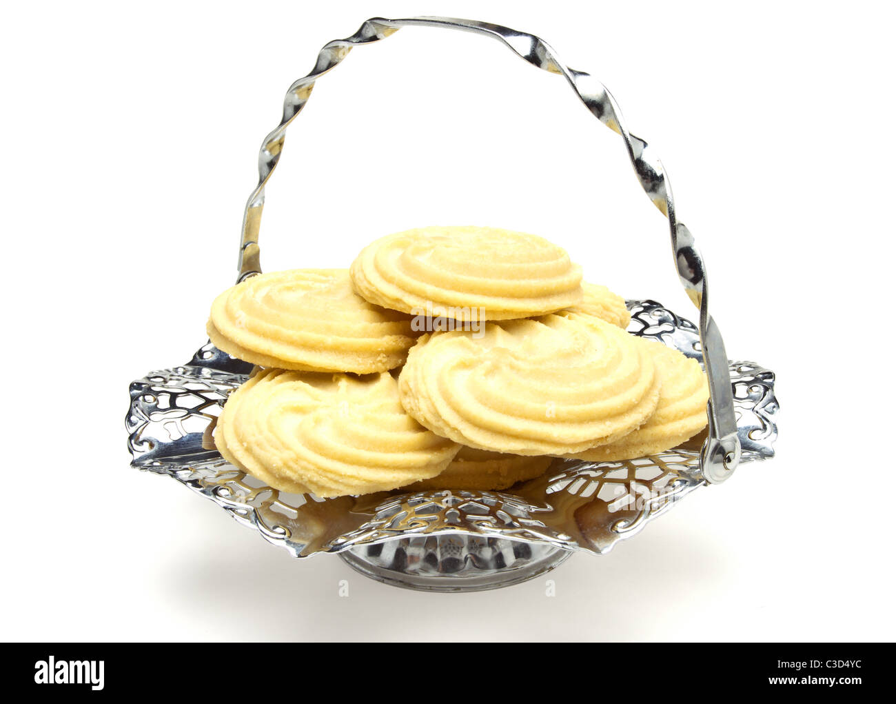 Viennese Swirl Biscuits on fancy chrome platter isolated on white. Stock Photo