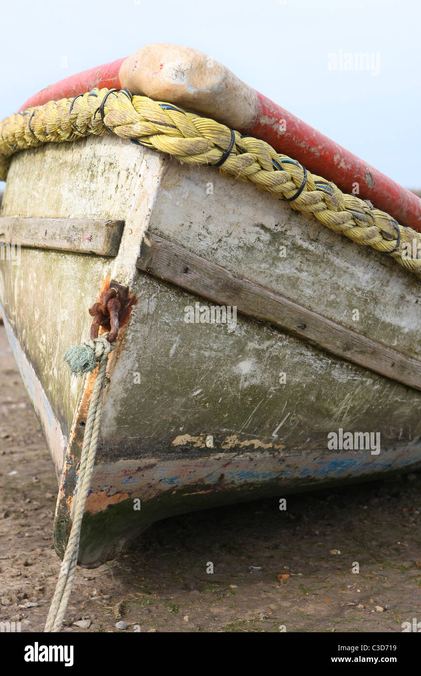 Close up of an old fishing rowing boat at Brancaster Staithe Norfolk