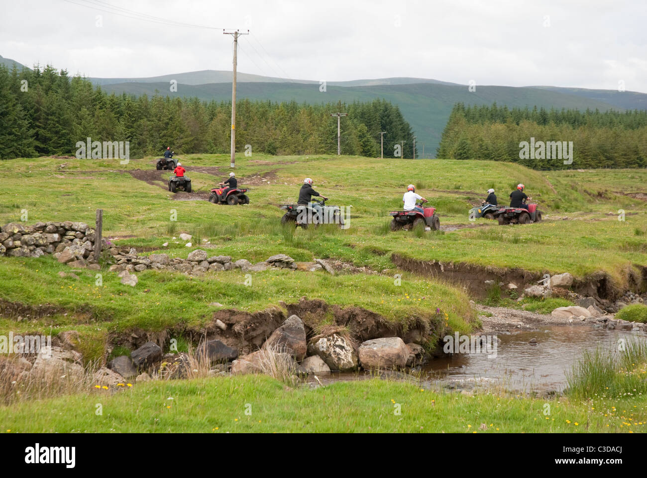 Quad bikes crossing rough terrain at an Activity Centre near Keswick in