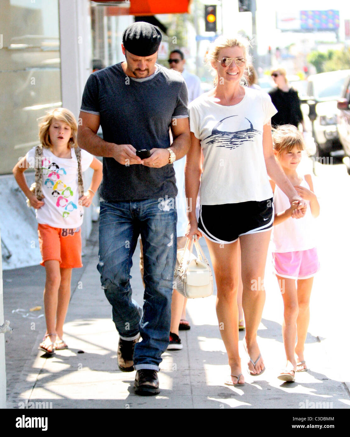 Tim McGraw and Faith Hill outside OrangeBone pet store with their children after looking at puppies Los Angeles, California - Stock Photo