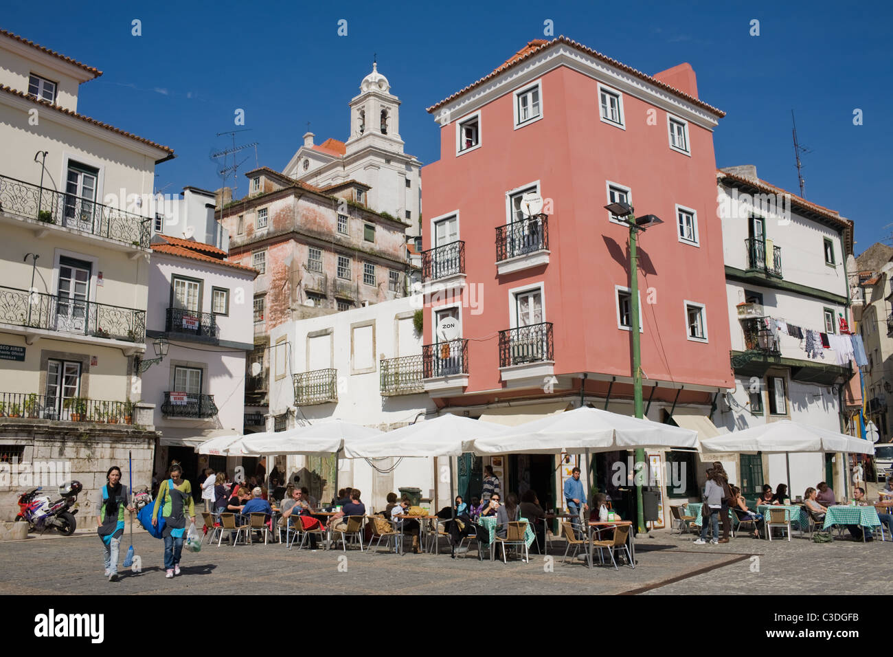 A busy square at lunchtime in Alfama, Lisbon, Portugal Stock Photo