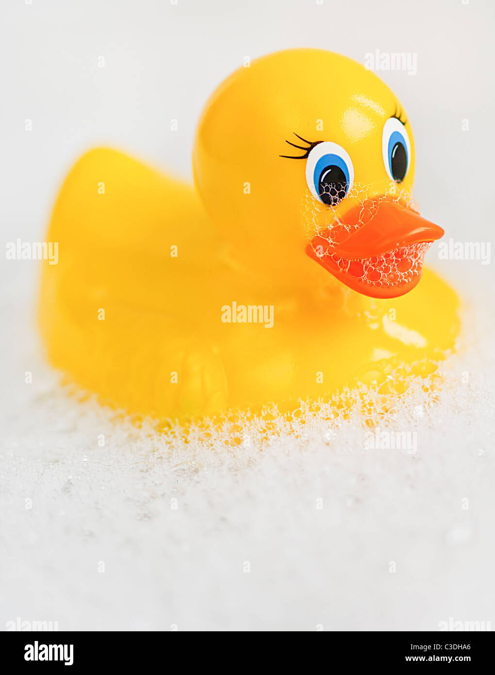 Bathtime fun with a yellow rubber ducky floating in a bathtub full of