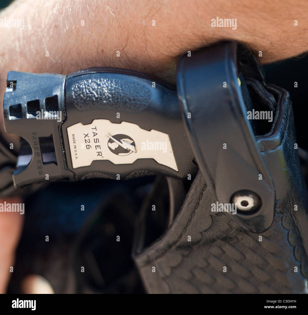 A Taser weapon in a holster Stock Photo