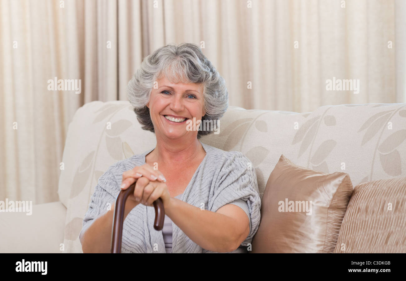 Woman with her walking stick Stock Photo - Alamy