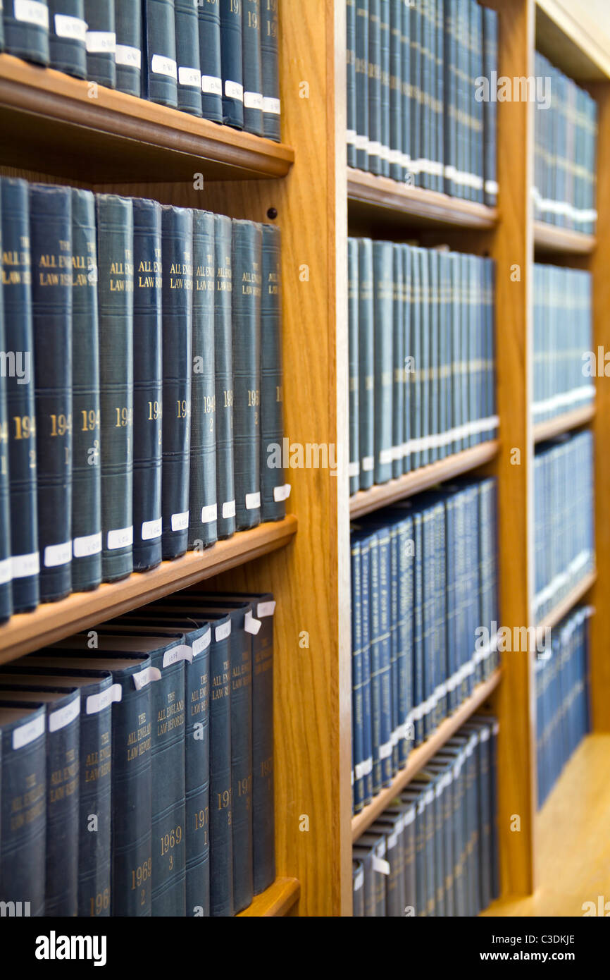 Blue Law Books Stacked On The Bookshelf Vertical View Stock Photo