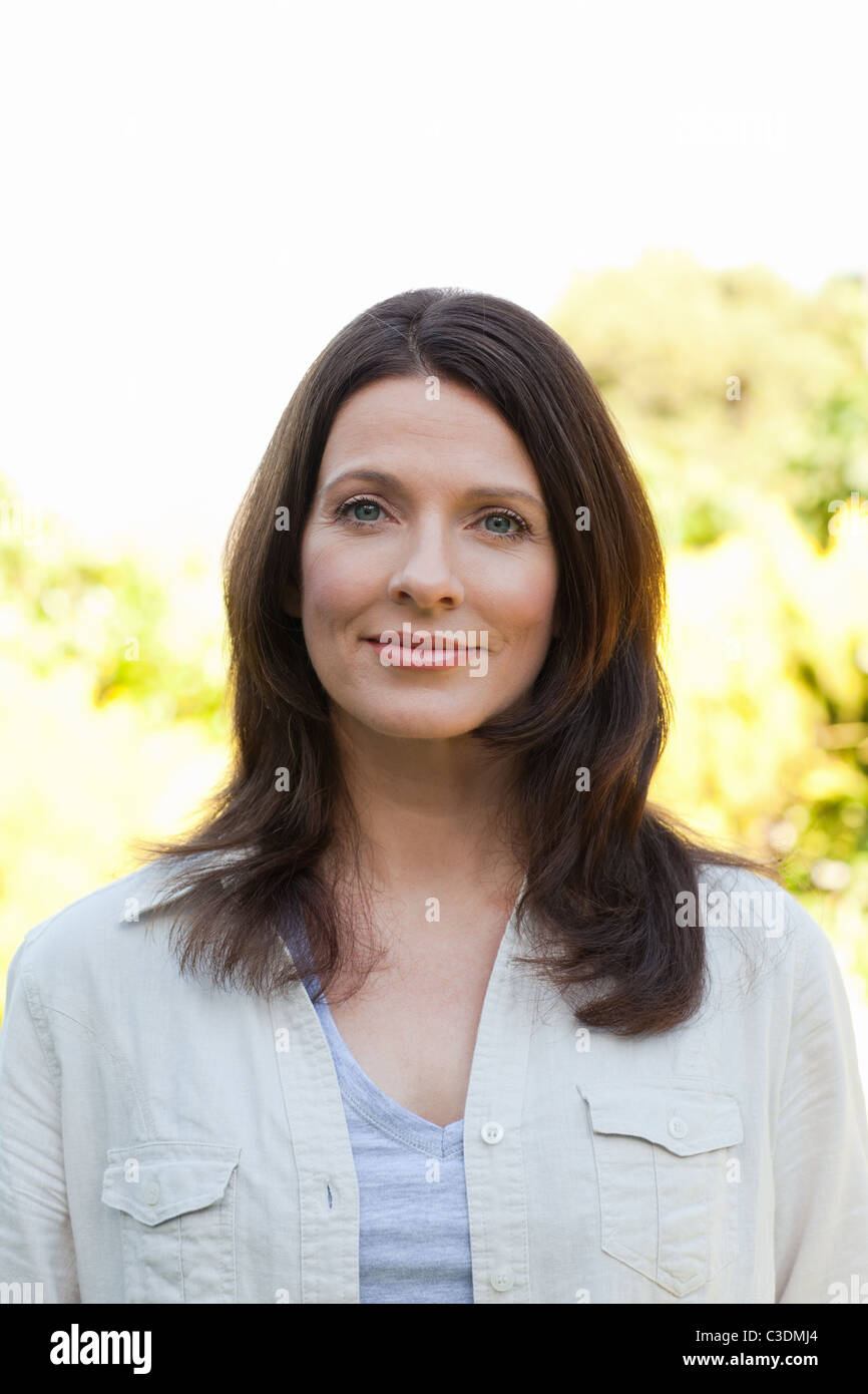 Portrait of a beautiful woman in the garden Stock Photo - Alamy