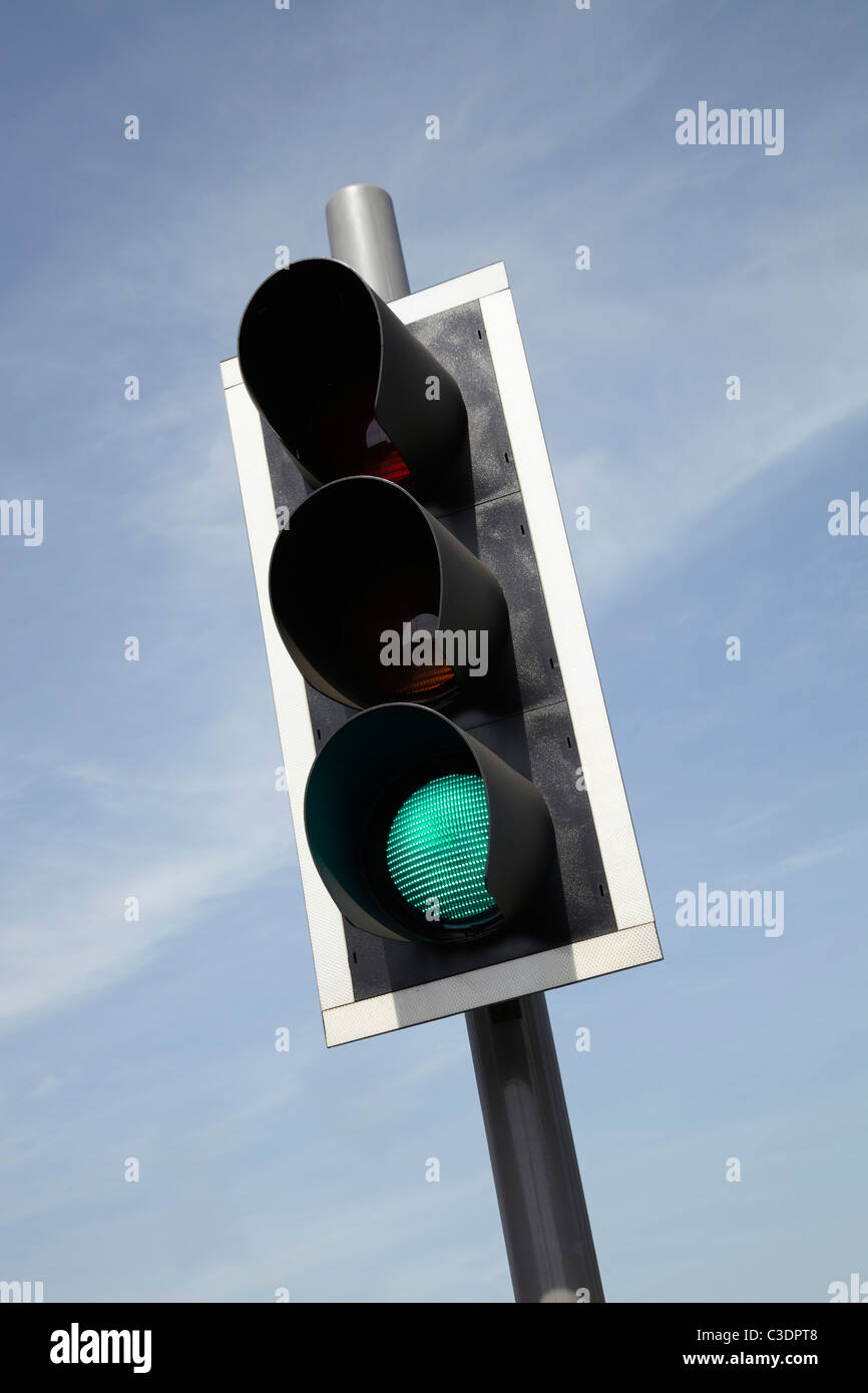 Traffic Light Showing Green In UK Traffic Light Shot From Below Traffic Light Showing Green In UK Traffic Light Shot From Below