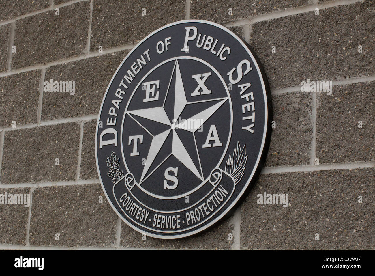 A plaque on the exterior of the Texas Department of Public Safety Crime