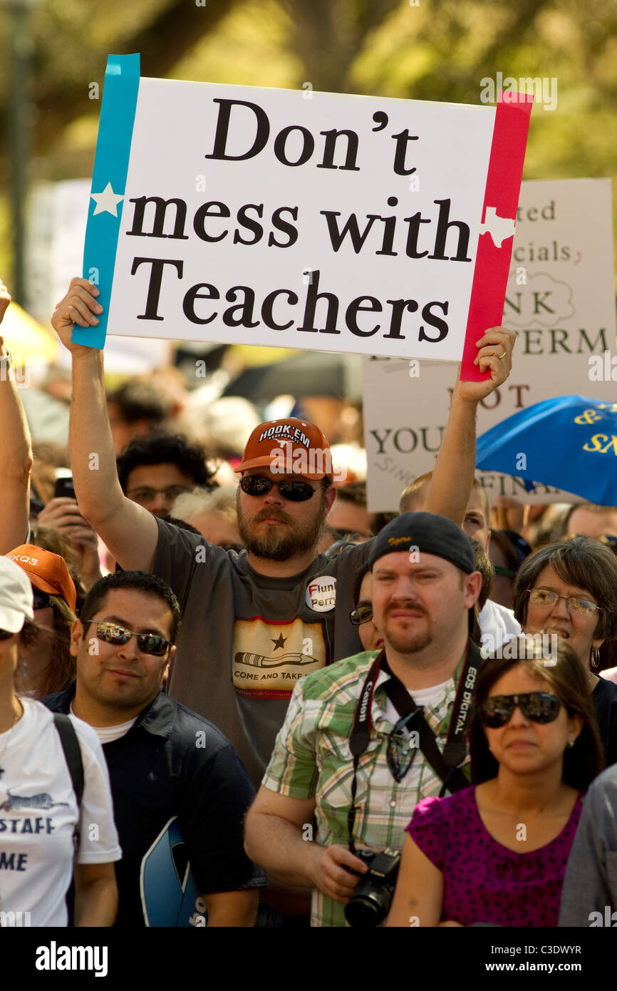 Students, teachers, educators and parents protest at rally against cuts