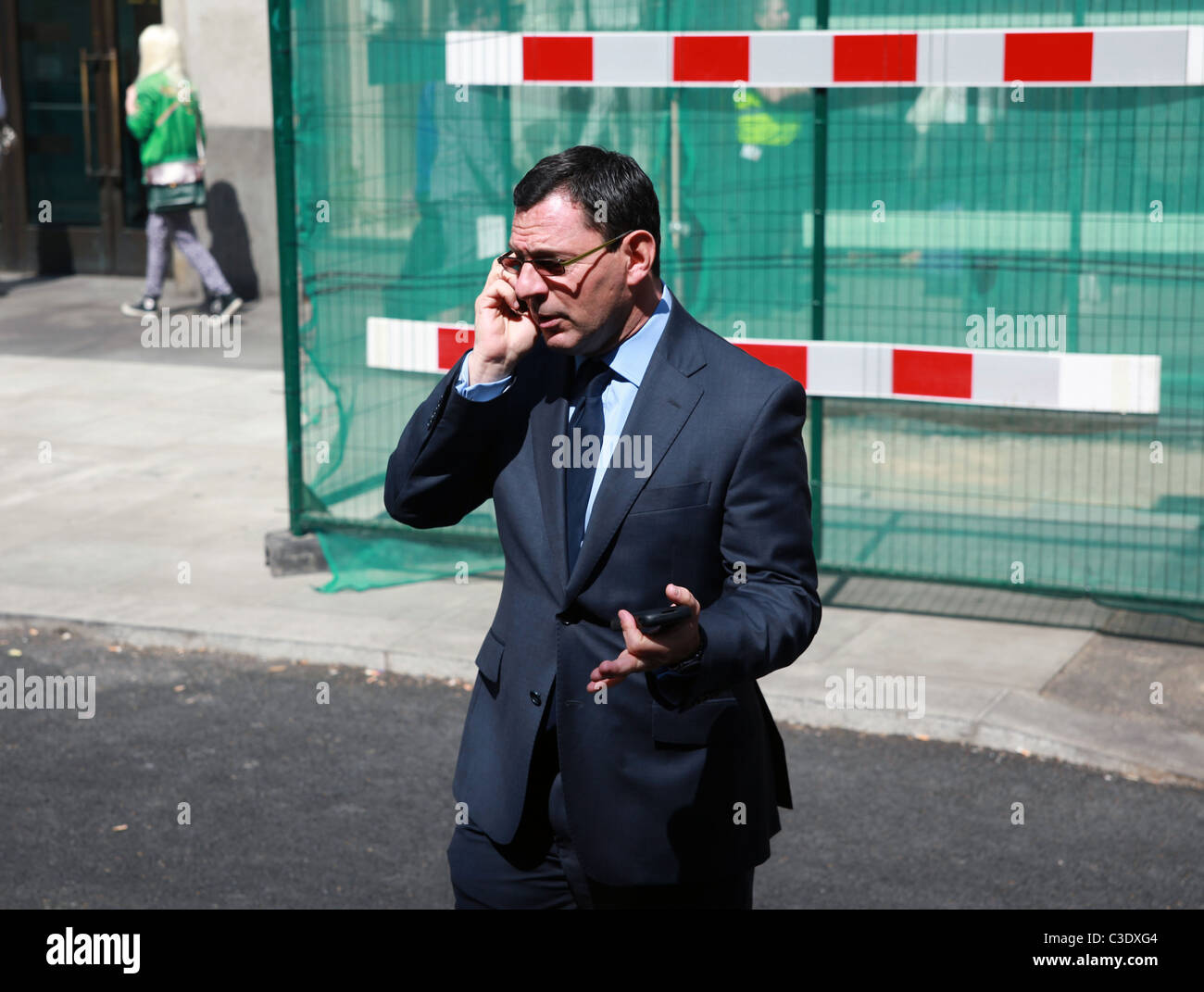 Oxford street in London with people on mobile phones Stock Photo Alamy
