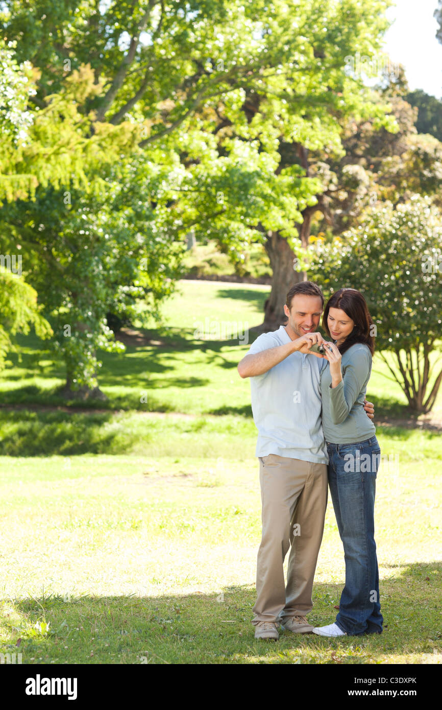 Couple in the park Stock Photo - Alamy