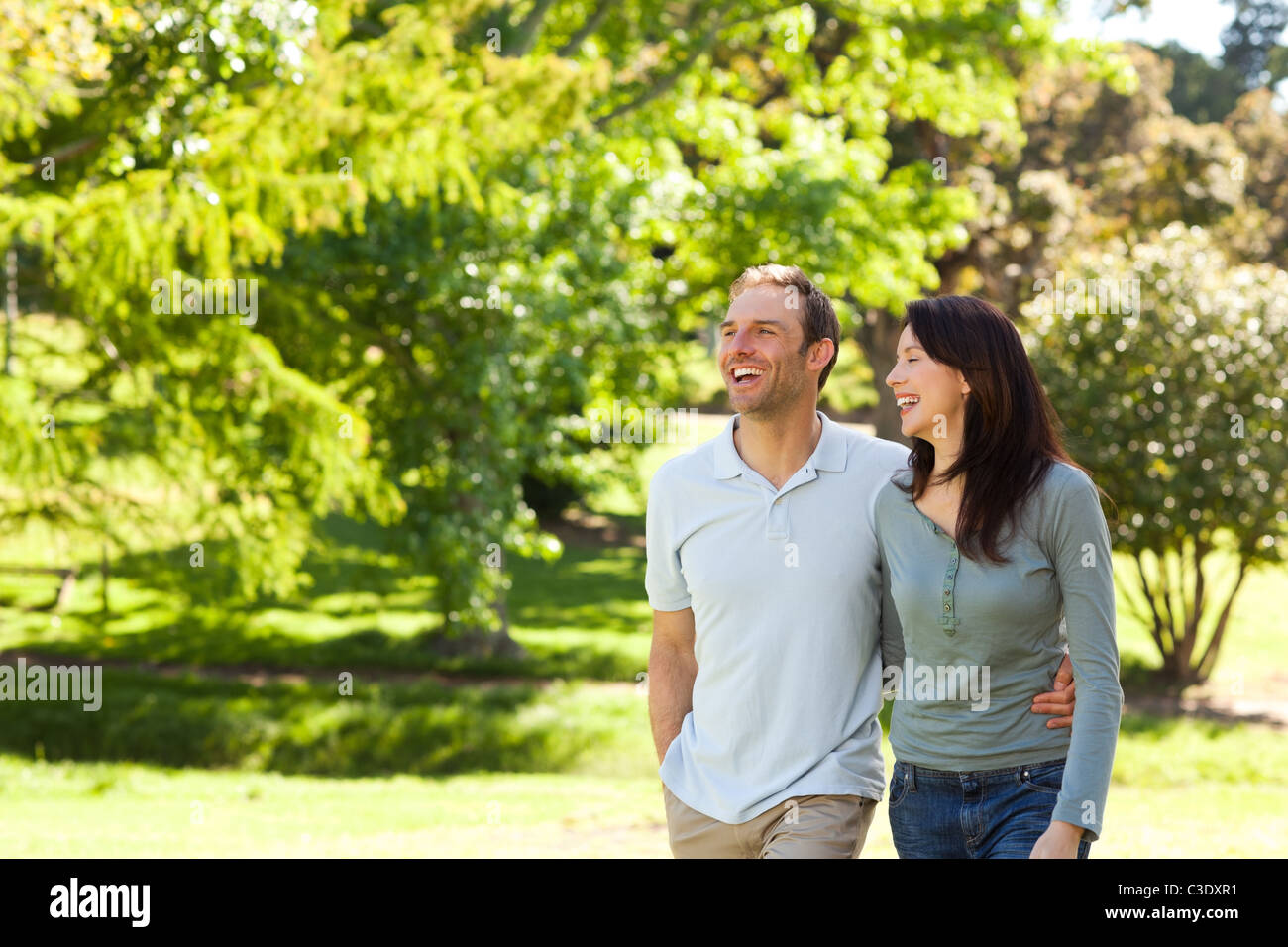 Couple in the park Stock Photo - Alamy