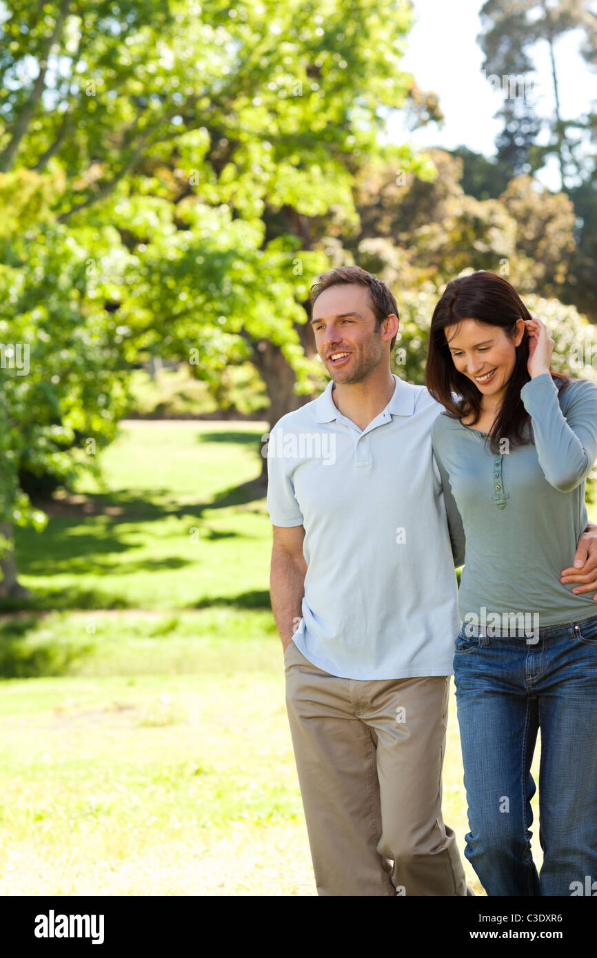 Couple in the park Stock Photo - Alamy