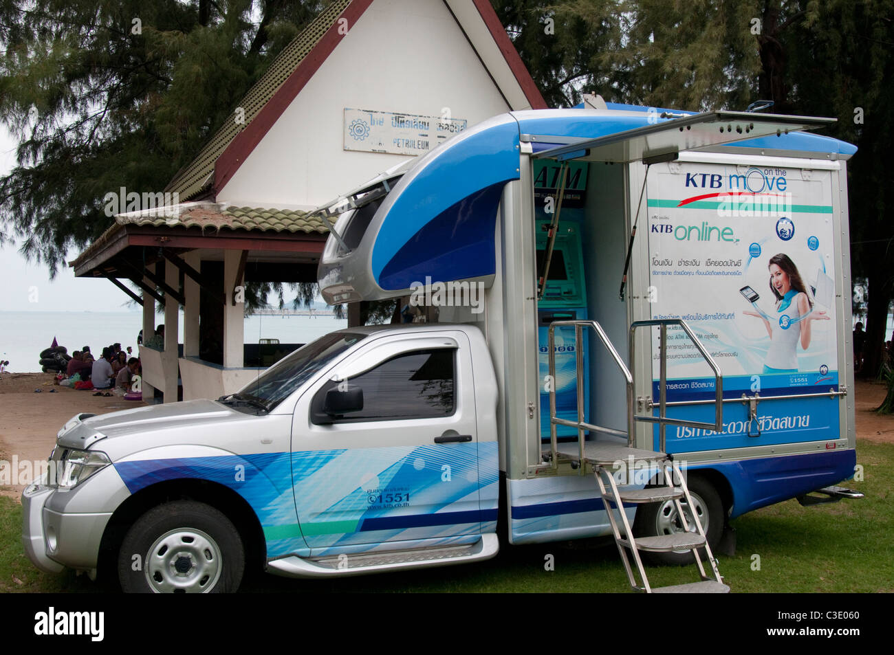 Mobile ATM or cash point machine parked at a popular beach outside Pattaya, Thailand Stock Photo