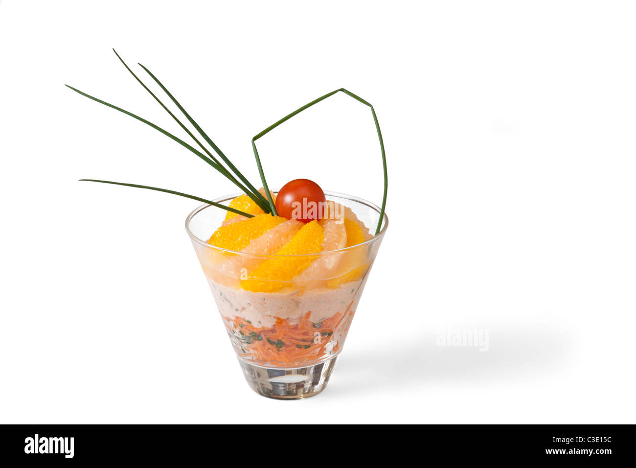 Citrus fruit and grated carrot based hors d'oeuvre, photographed in the studio. Hors-d'œuvre à base d'agrumes et de carottes. Stock Photo